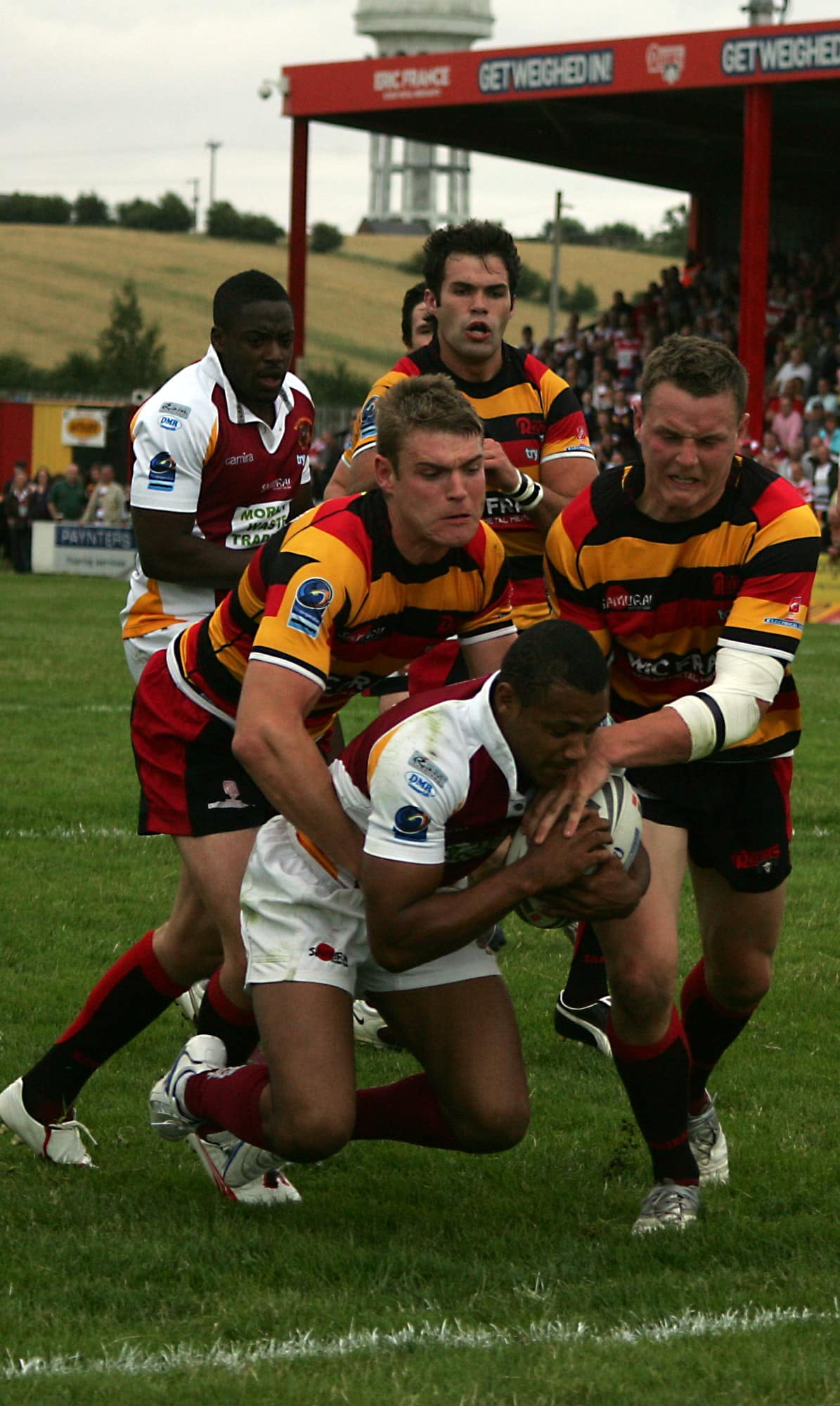 2010 - Batley v Dewsbury - Rams Alex Bretherton & Ed Barber tackle Campbell